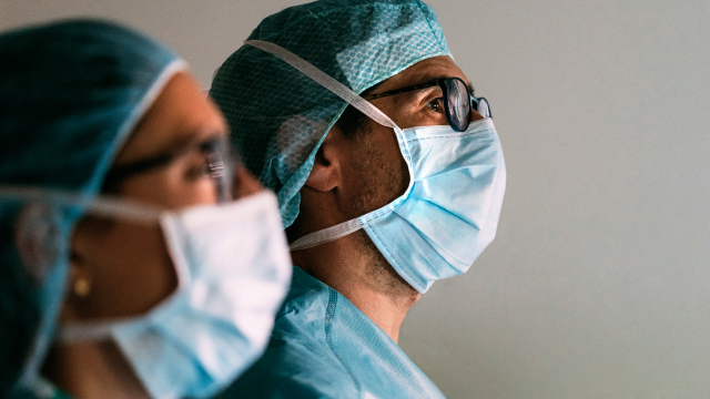 Healthcare professionals wearing surgical masks